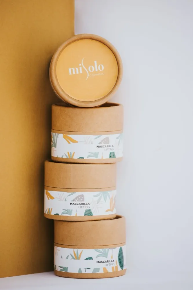 Stacked kraft packaging tubes for a cosmetics packaging design system