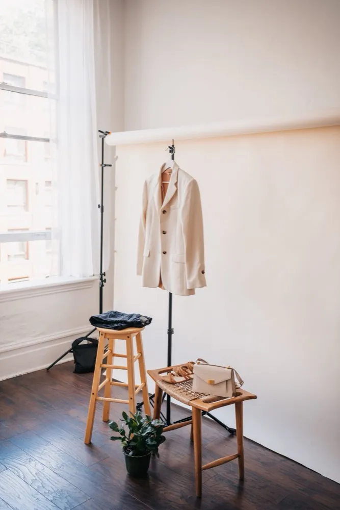 Styled clothing rack and accessories for a fashion photography shoot